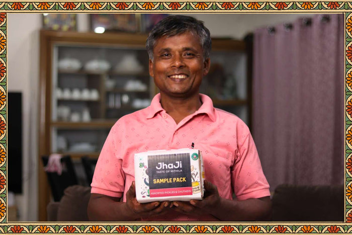 Sanjay proudly holding the JhaJi Sample Pack — a tribute to earthy pickles and Bihar’s local food culture